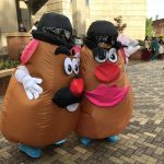 Two people dressed as Mr. Potato Head