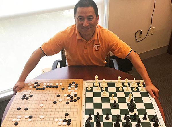 Fran Li with Go Board and Chess Board