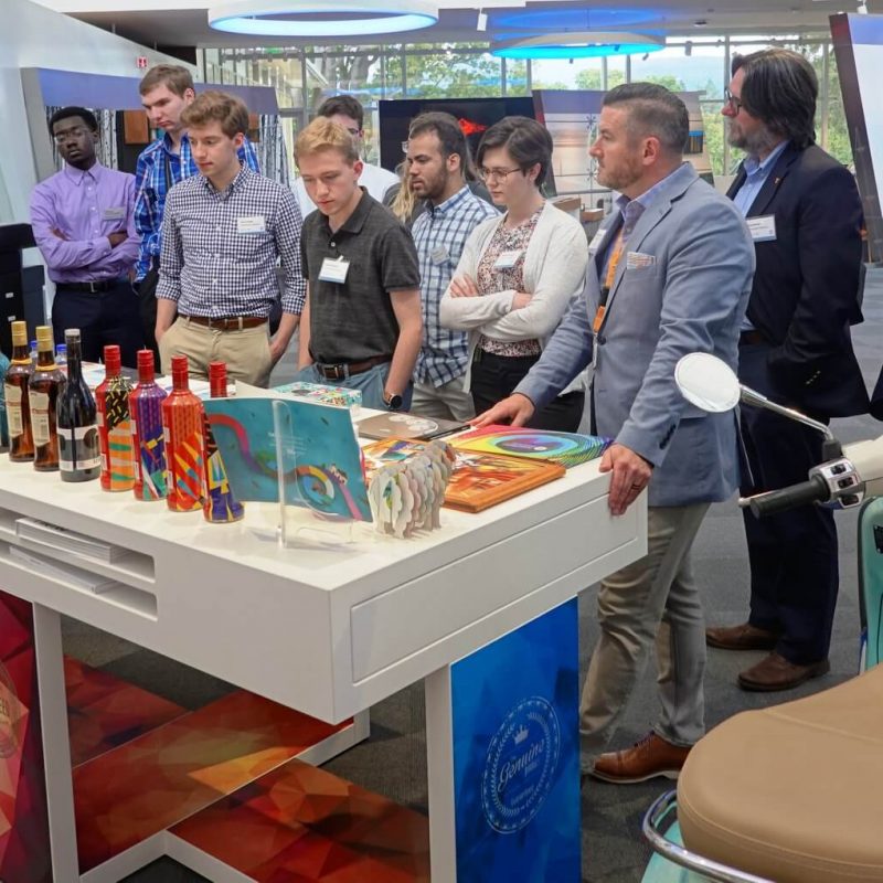 Co-host Marc Mariano talks about customized print products such as personalized Coke bottles & Oreo cookies at HP Inc.'s Customer Welcome Center with students on UTK's Silicon Valley Experience tour. — with Marc Mariano, Rickey A McCallum and Brian Broyles in Palo Alto, California.