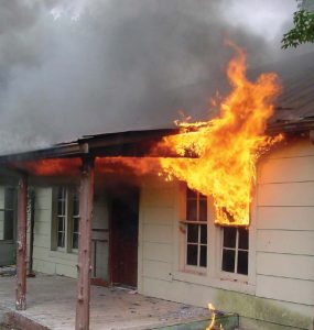 Picture of a burning house, for the Graduate Concentration in Fire Protection Engineering