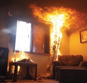 Picture of the interior of a burning house, Picture of a burning house, for the Graduate Concentration in Fire Protection Engineering