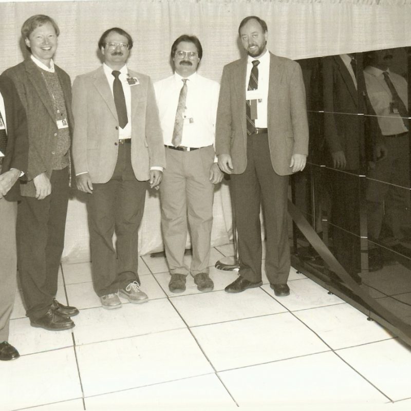 1995, Oak Ridge National Lab, Intel Paragon XP/S 150 MP supercomputer with 3,072 processors, number 3 on the Top500 list in 1995. Dongarra is the last in line standing on the far right.