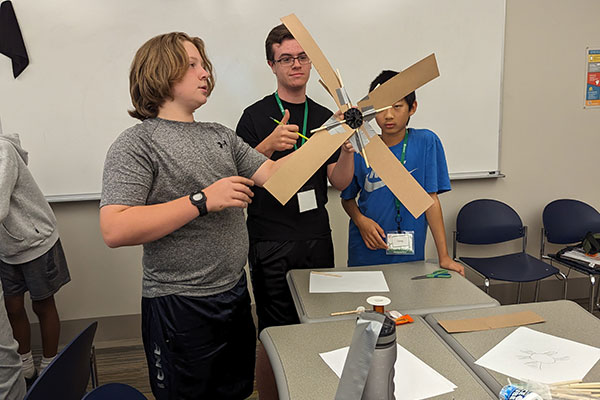Students engineer a device in a hands-on project.