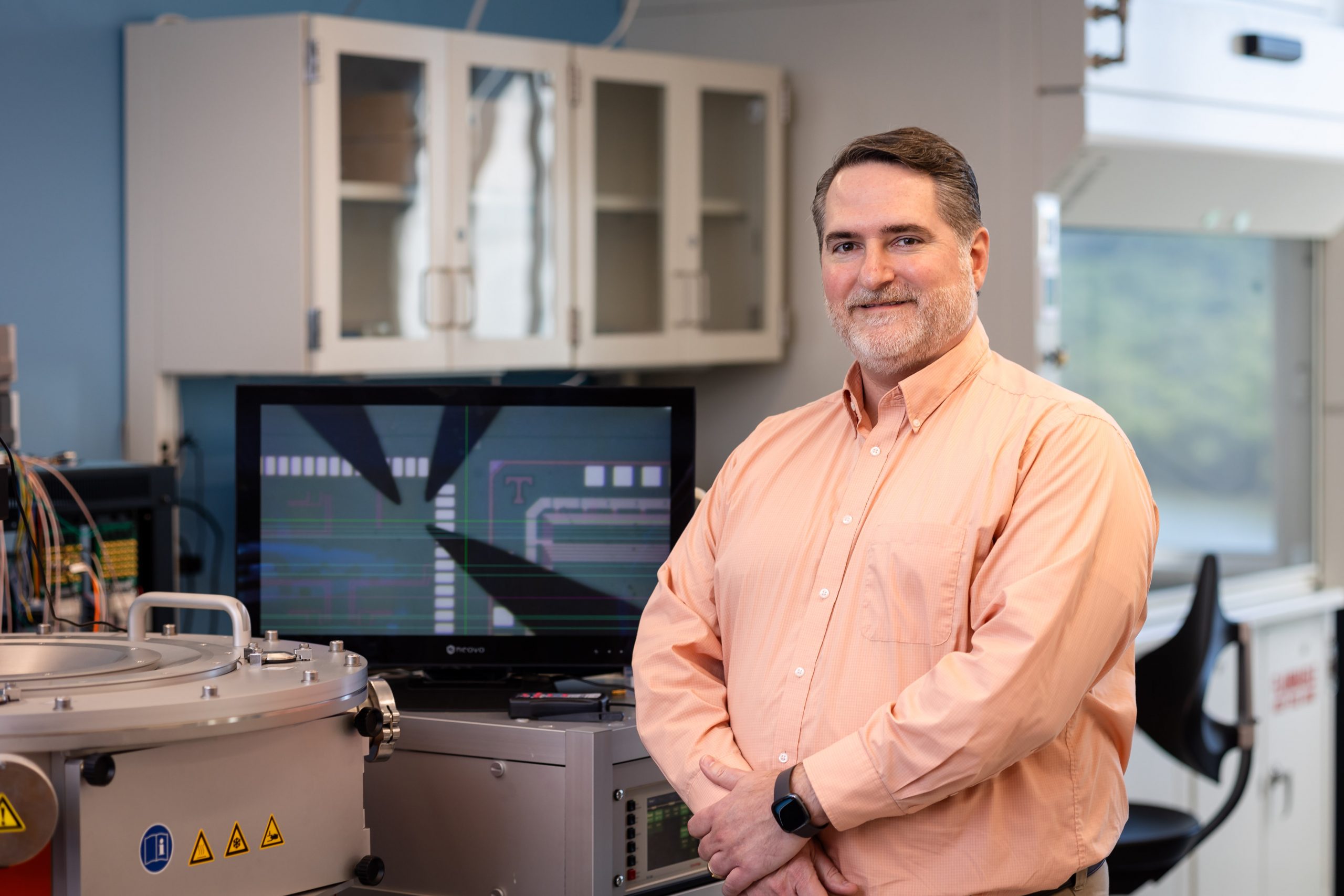 Garrett Rose standing in a lab